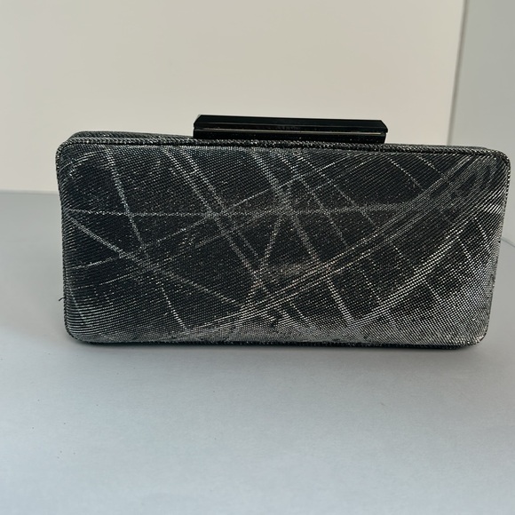 Sondra Roberts Hard Case Convertible Clutch
Black/silver Metallic - Picture 5 of 6